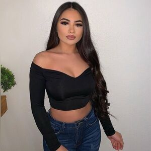 Super soft off the shoulder with a slight v neck long sleeve top